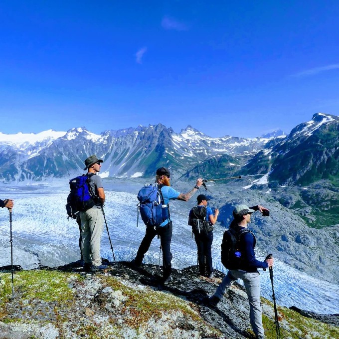 Group Hiking with Snow Mountain View