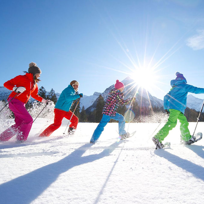 Group Snowshoeing in Mountains