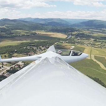 Glider in Sky with Mountain View