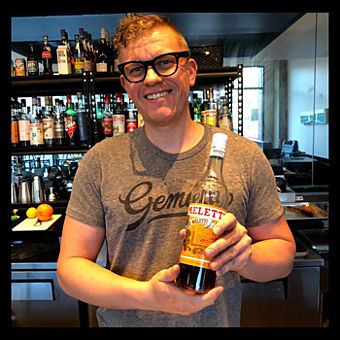 Holding a drink on Happy Hour Tour in Austin Holding a drink on Happy Hour Tour in Austin