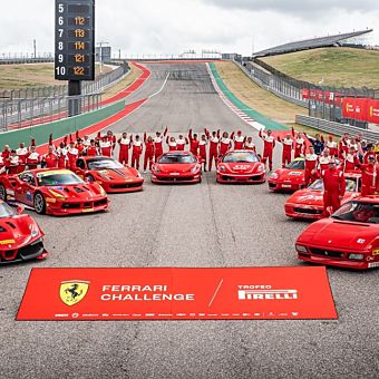 Group of Red Ferrari's on Track
