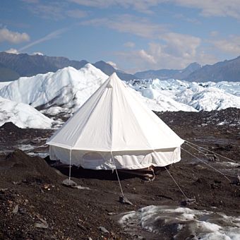 White Tent Pitched on Snowy Mountain White Tent Pitched on Snowy Mountain