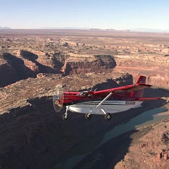 Red Plane Over Canyon