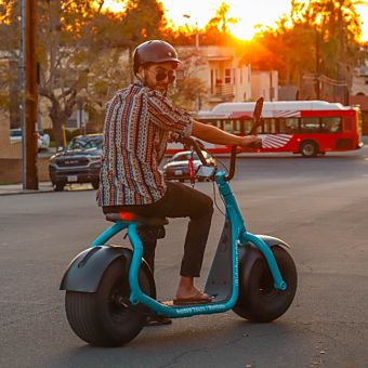 Man on Blue Scooter 