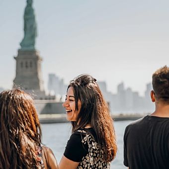 Group in Front of Statue of Liberty Group in Front of Statue of Liberty