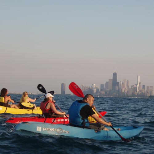 Skyline Backdrop During Night Paddle in Chicago