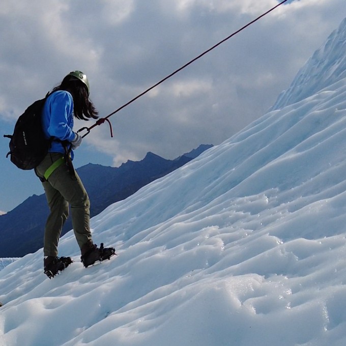 Man on Rope Climbing Glacier