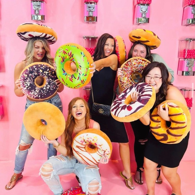 Group of Girls Posing with Doughnuts