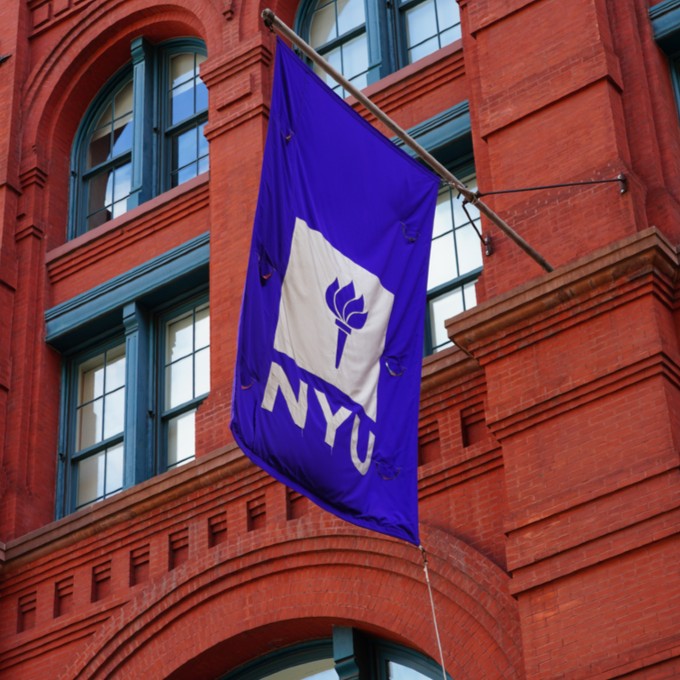 NYU College Flag on Building