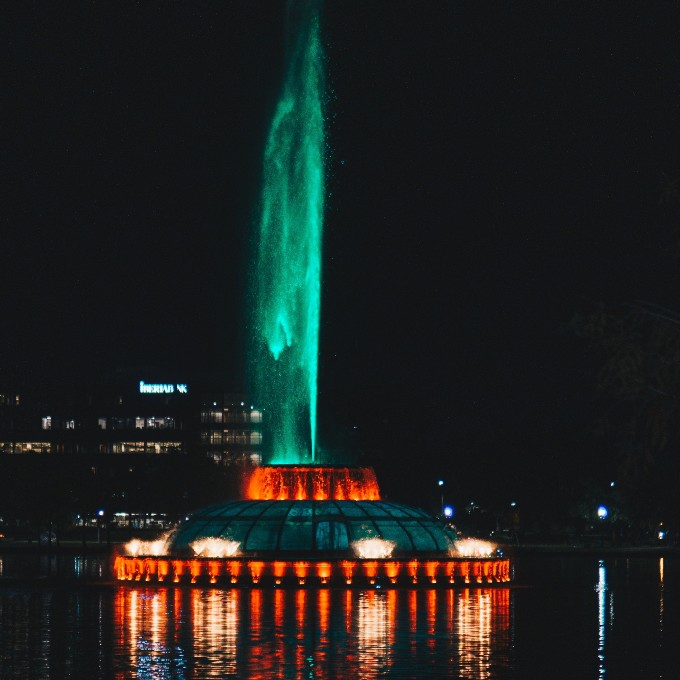 Water Fountain in Lake at Night