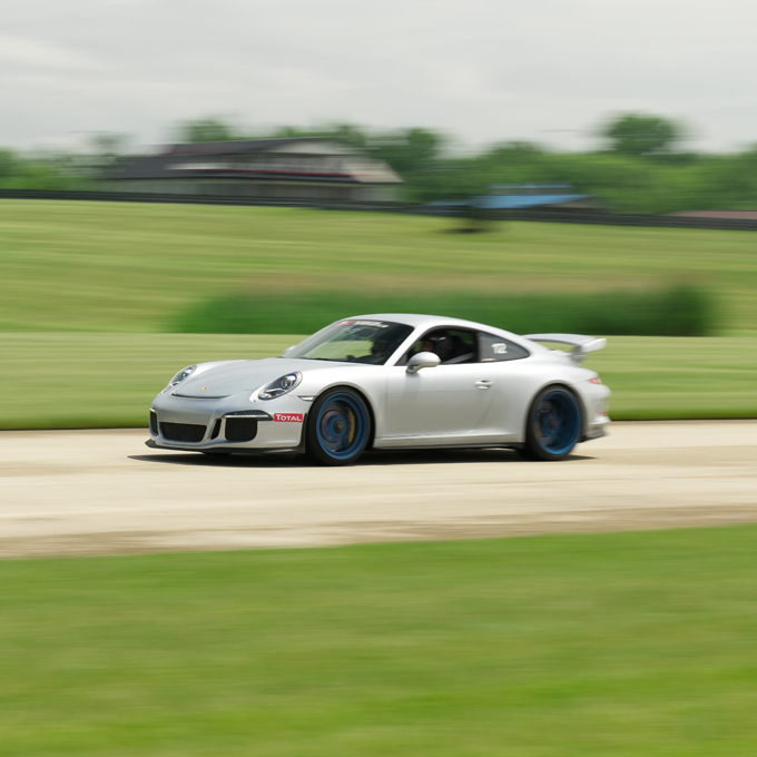 Race a Porsche 911 GT3 near Dallas