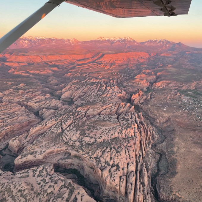 Plane Over Canyon at Sunset