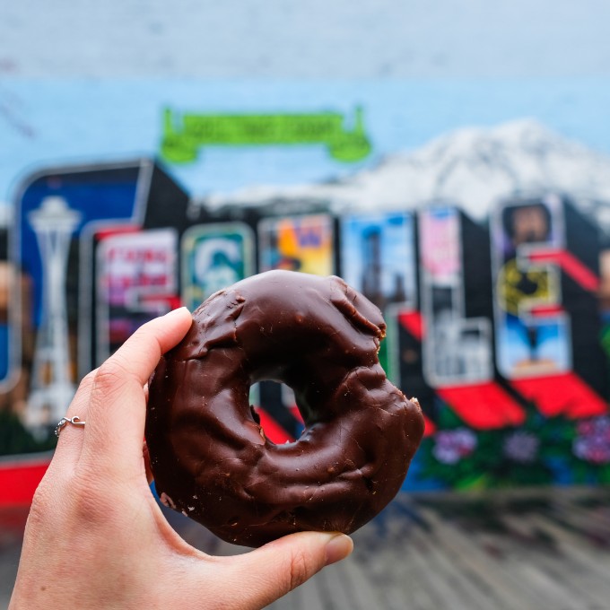 Chocolate Donut in Front of Seattle Bench